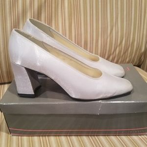 Silver heels, size 7.5 wide.